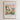 The image is a framed poster depicting a colorful illustration of a desert landscape with buildings, palm trees, and other desert flora. The poster is titled "HOSANNA TO THE SON OF DAVID" and includes a biblical verse from Matthew 29.
