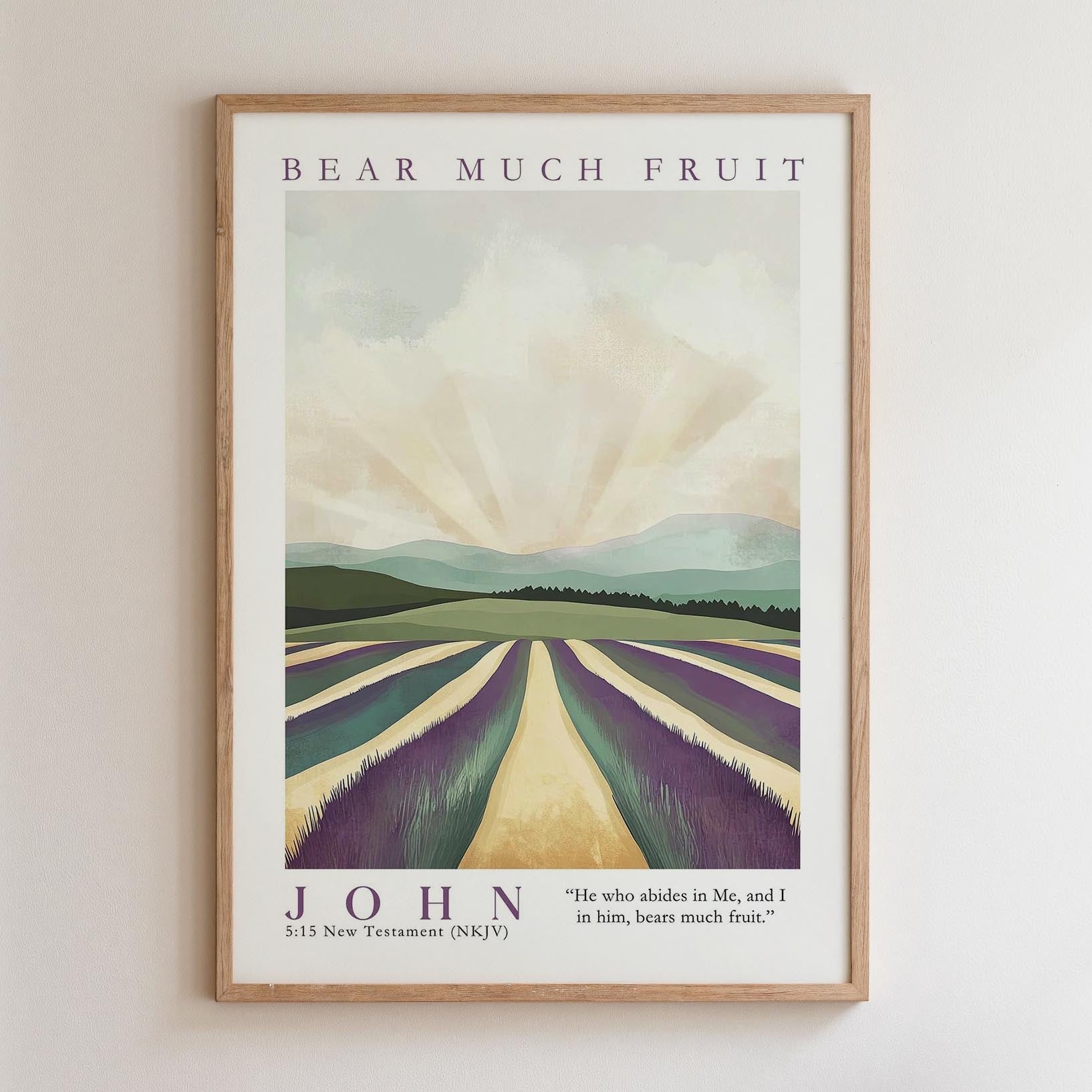 The image is a framed poster featuring a landscape with a field of purple flowers and a mountain range in the background. The poster has a vintage style and is framed in a wooden frame.