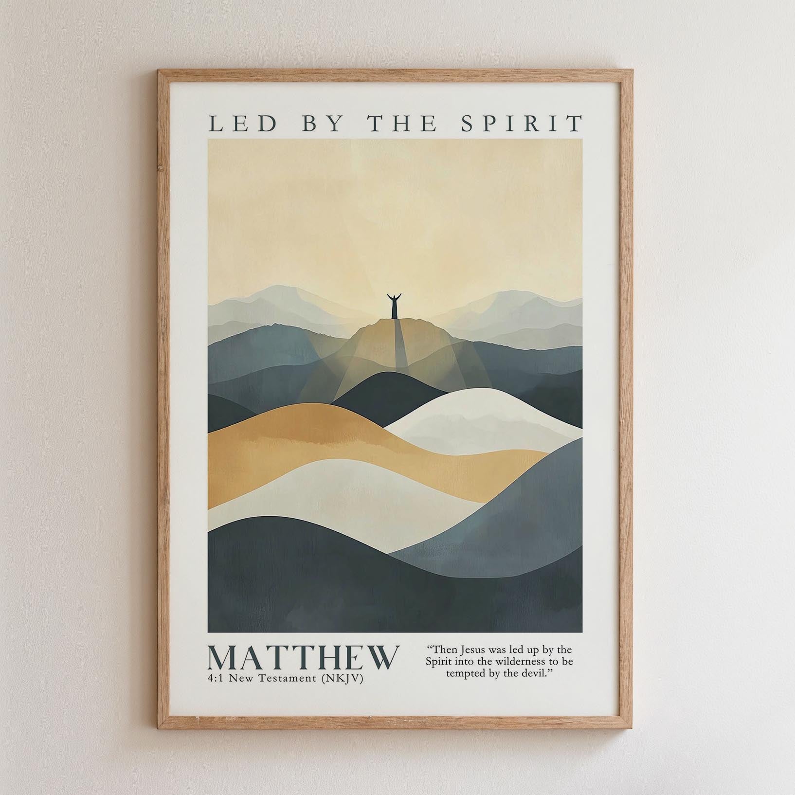 The image is a framed poster featuring a mountain landscape with a silhouette of a person standing on a peak. The poster includes a quote from the New Testament about Matthew, and the text is in a modern, minimalist style.