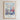 The image is a framed poster with a colorful illustration of a cityscape filled with flowers and greenery. The poster has a religious message and a Bible verse from Colossians 3:12.