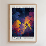The image is a framed poster depicting a biblical scene with a man kneeling in front of a lion and a lamb, surrounded by other animals and plants. The text above the poster reads "GOD IS WITH YOU IN THE FIRE" and below the poster is the text "DANIEL 622 Old Testament".
