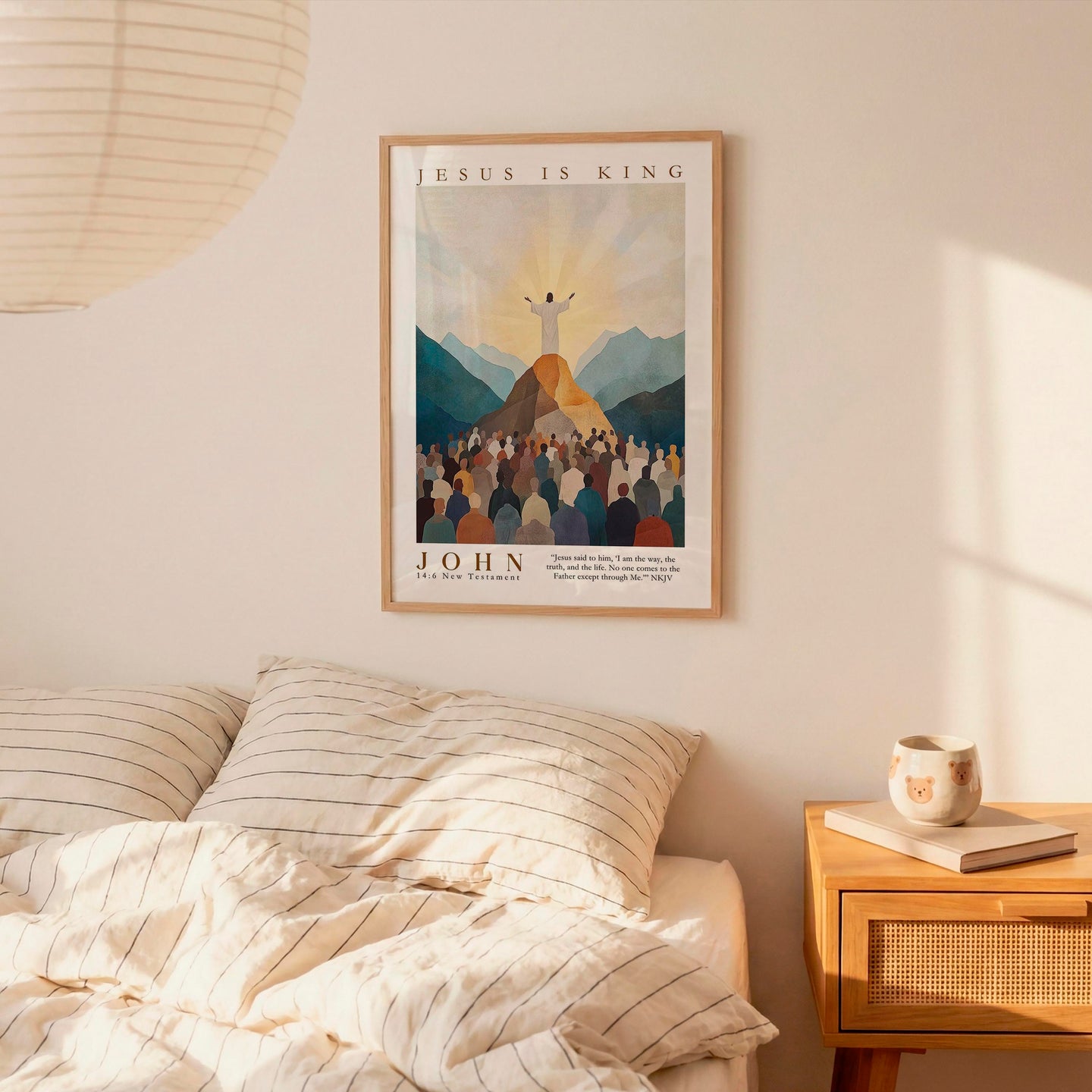 a bedroom scene with a framed poster of a religious illustration hanging on the wall, depicting a figure standing on a mountain with a crowd of people behind them.