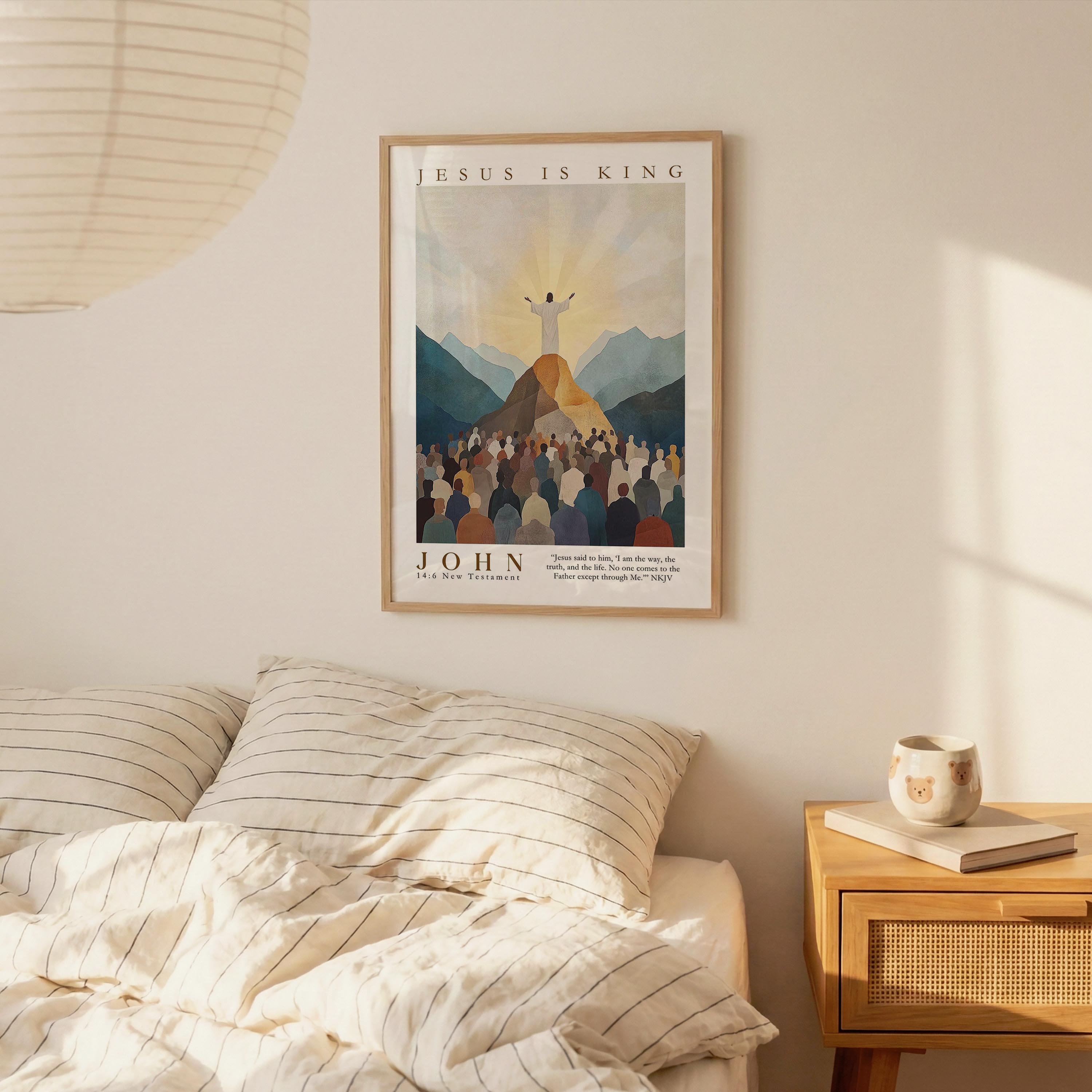 a bedroom scene with a framed poster of a religious illustration hanging on the wall, depicting a figure standing on a mountain with a crowd of people behind them.